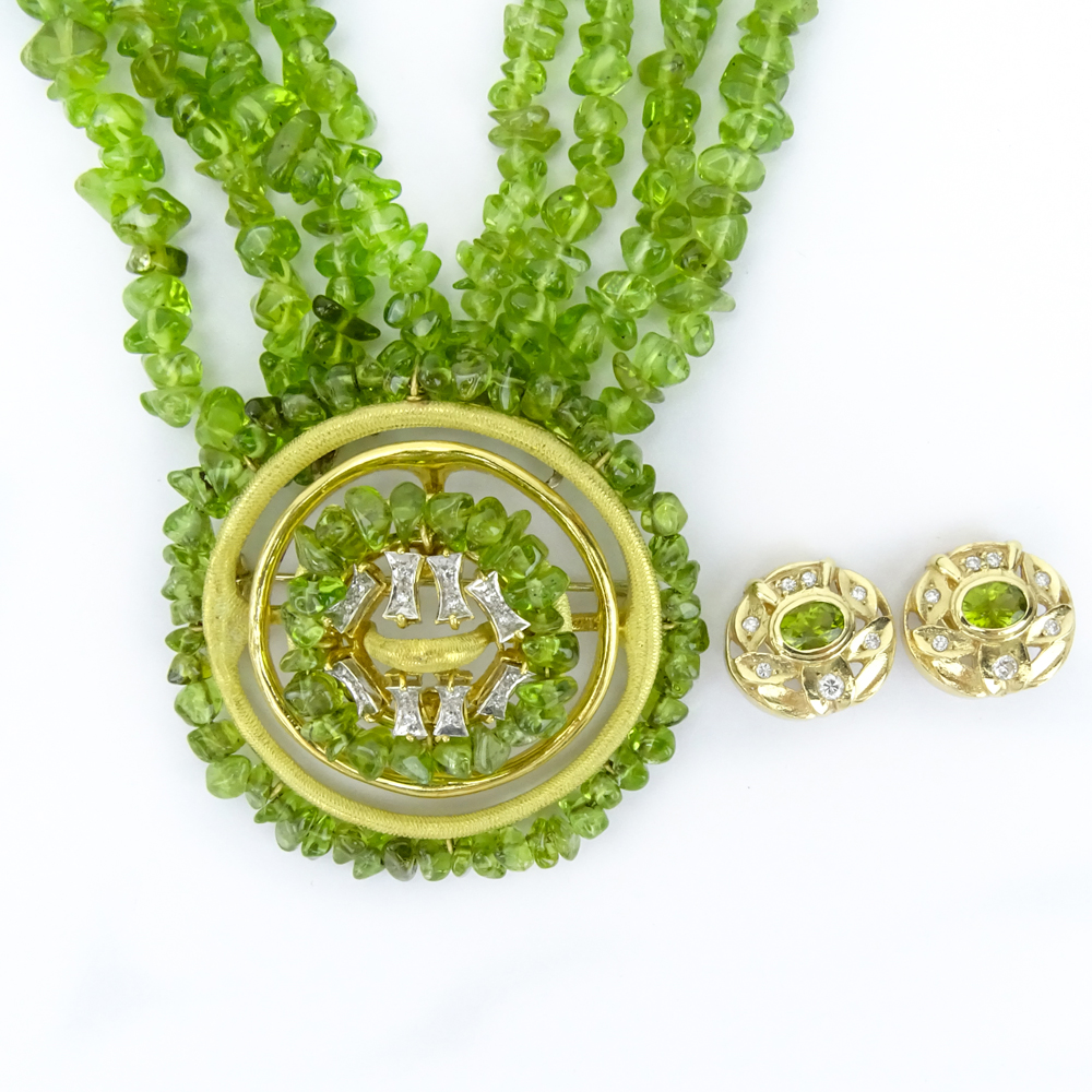 Vintage Peridot, Diamond and Gold Suite Including: Multi Strand Peridot Bead Necklace with 18 Karat Yellow Gold and Diamond Pendant / Brooch and Pair of Oval Cut Peridot, Diamond and 14 Karat Yellow Gold Ear clips