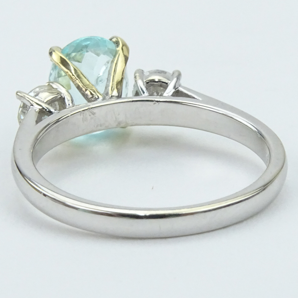  1.73 Carat Oval Cut Light Greenish Blue Paraiba Tourmaline, Diamond and 18 Karat White Gold Ring. 