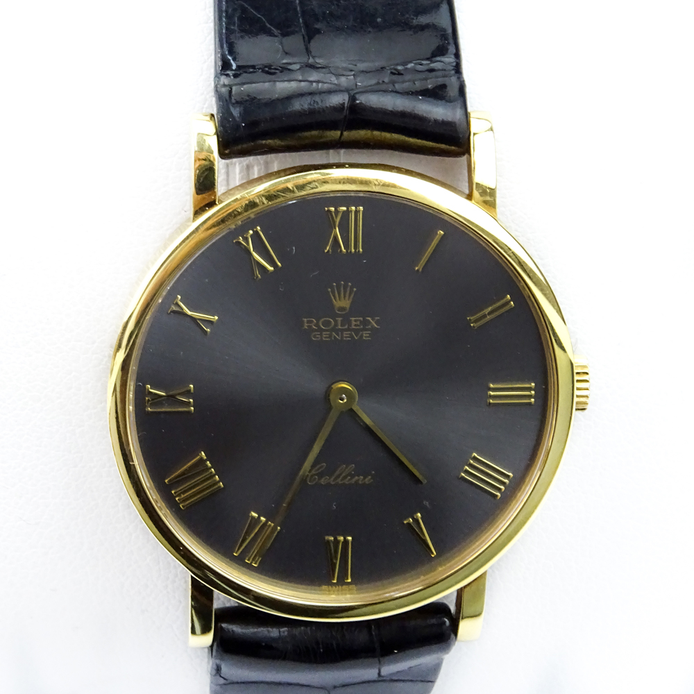 Vintage Rolex Cellini Classic 18 Karat Yellow Gold Watch with Slate Dial and Roman Numeral Hour Markers 5112, Manual Movement, 18 Karat Yellow Gold Buckle and Crocodile Strap