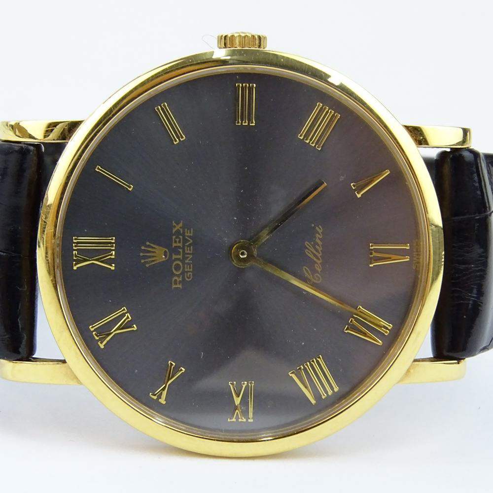 Vintage Rolex Cellini Classic 18 Karat Yellow Gold Watch with Slate Dial and Roman Numeral Hour Markers 5112, Manual Movement, 18 Karat Yellow Gold Buckle and Crocodile Strap