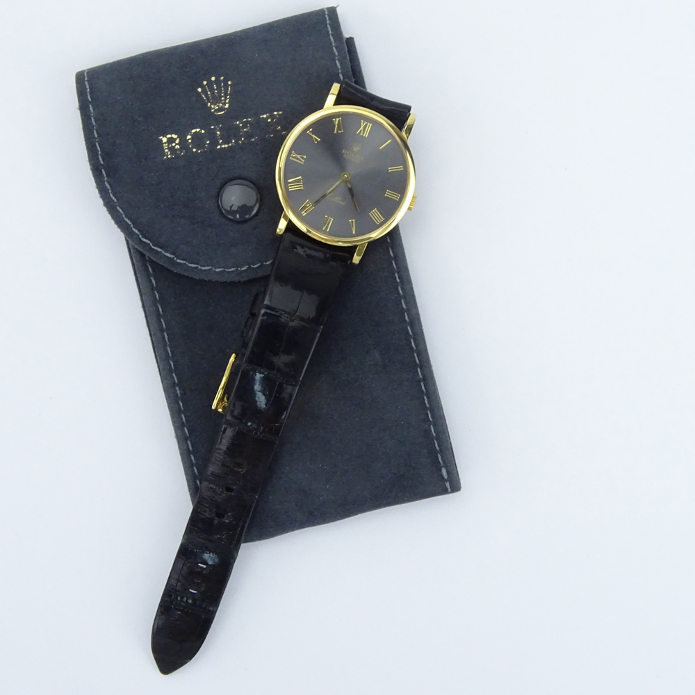 Vintage Rolex Cellini Classic 18 Karat Yellow Gold Watch with Slate Dial and Roman Numeral Hour Markers 5112, Manual Movement, 18 Karat Yellow Gold Buckle and Crocodile Strap