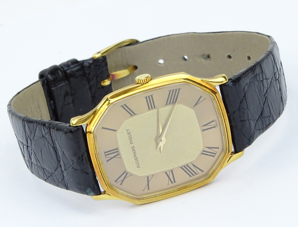 Vintage Audemars Piguet 18 Karat Yellow Gold Watch with Roman Numeral Hour Markers, Manual Movement, 18 Karat Yellow Gold Buckle, Crocodile Strap