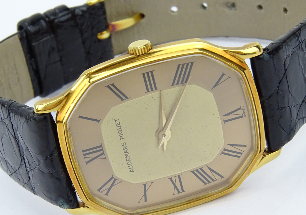 Vintage Audemars Piguet 18 Karat Yellow Gold Watch with Roman Numeral Hour Markers, Manual Movement, 18 Karat Yellow Gold Buckle, Crocodile Strap