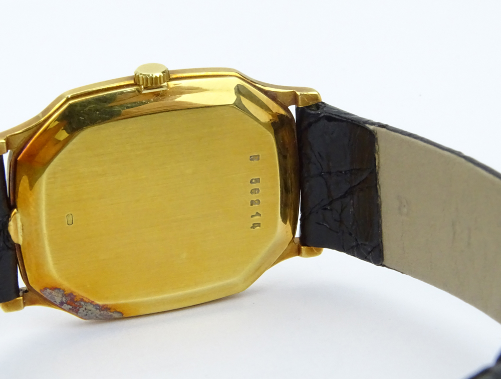 Vintage Audemars Piguet 18 Karat Yellow Gold Watch with Roman Numeral Hour Markers, Manual Movement, 18 Karat Yellow Gold Buckle, Crocodile Strap