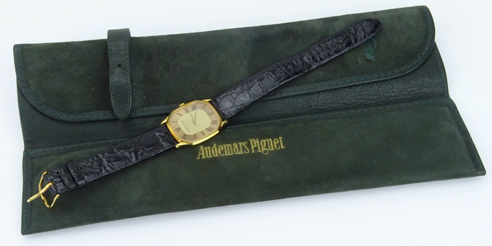 Vintage Audemars Piguet 18 Karat Yellow Gold Watch with Roman Numeral Hour Markers, Manual Movement, 18 Karat Yellow Gold Buckle, Crocodile Strap