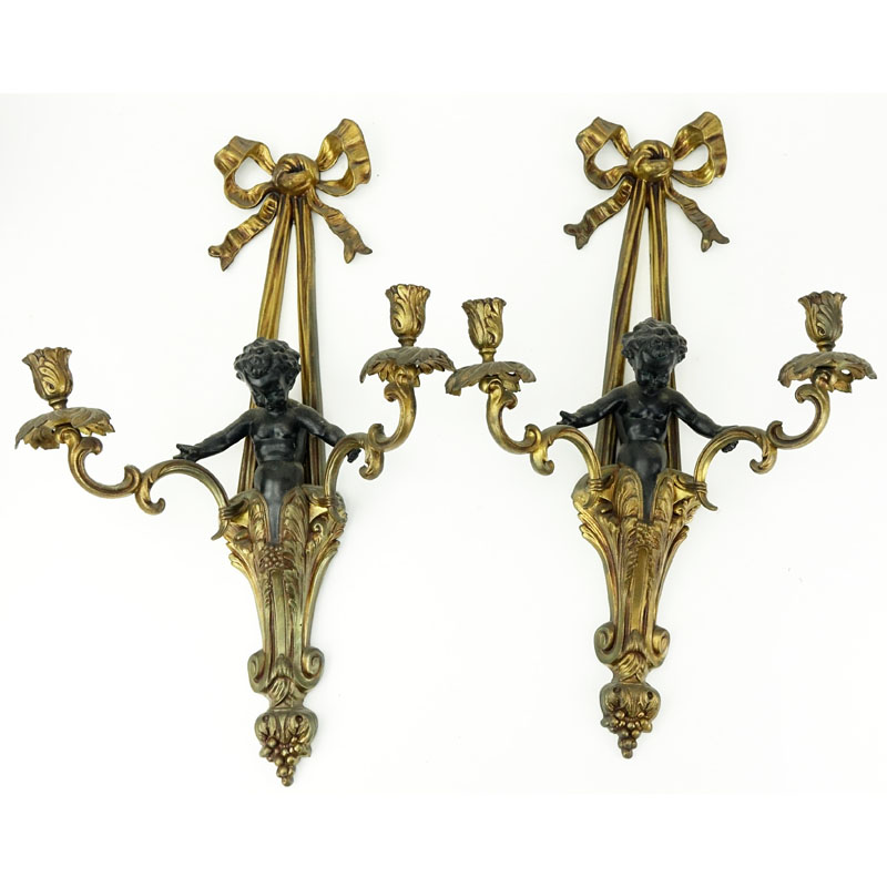 Pair of Louis XVI Style Gilt Bronze Figural Sconces