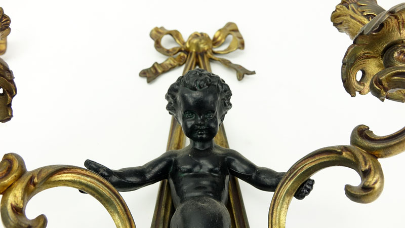 Pair of Louis XVI Style Gilt Bronze Figural Sconces