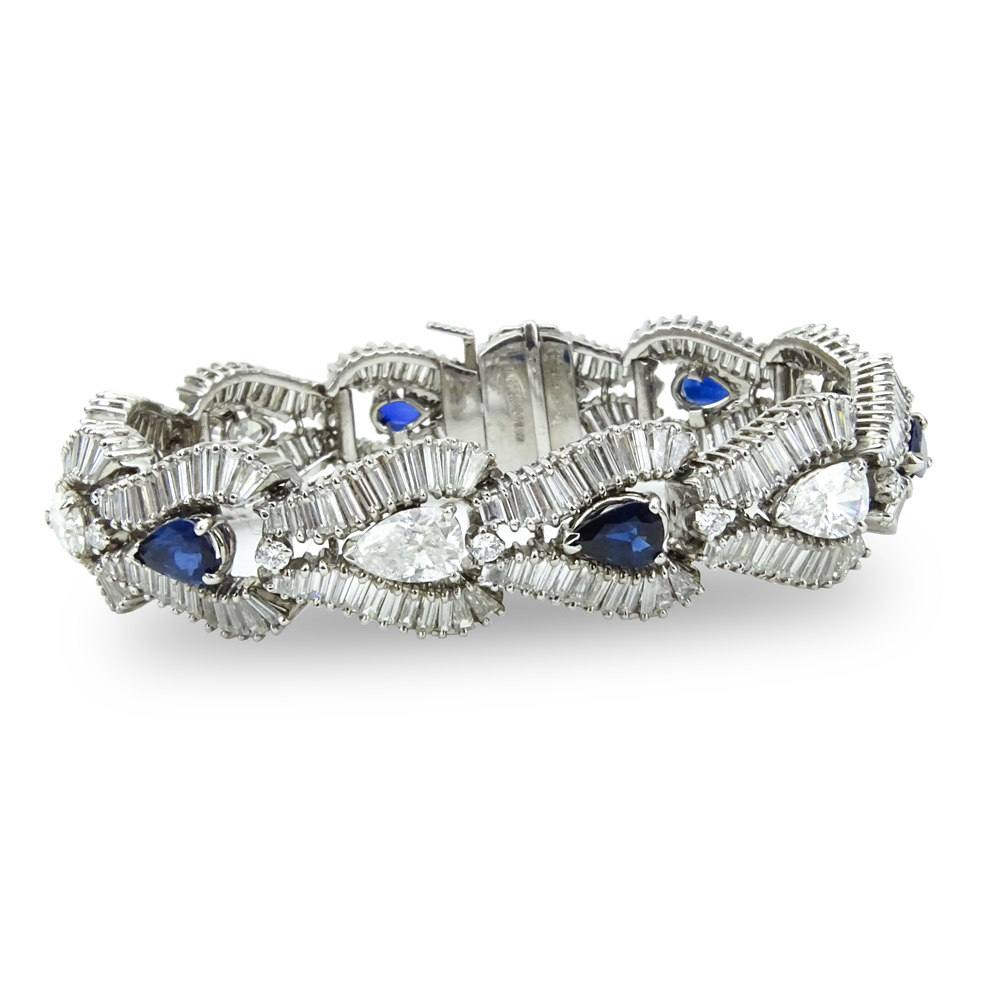 1950s Approx. 21.0 Carat Pear Shape and Baguette Cut Diamond, 4.8 Carat Pear Shape Sapphire and Platinum Bracelet. 