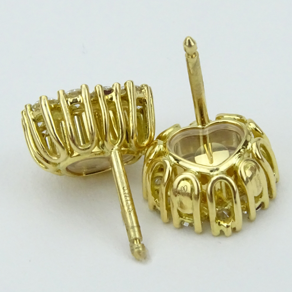 1.10 Carat Round Brilliant Cut Diamond and 18 Karat Yellow Gold Hearts Earrings.