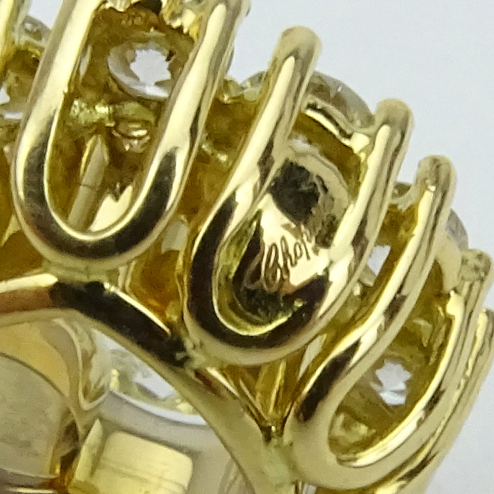 1.10 Carat Round Brilliant Cut Diamond and 18 Karat Yellow Gold Hearts Earrings.