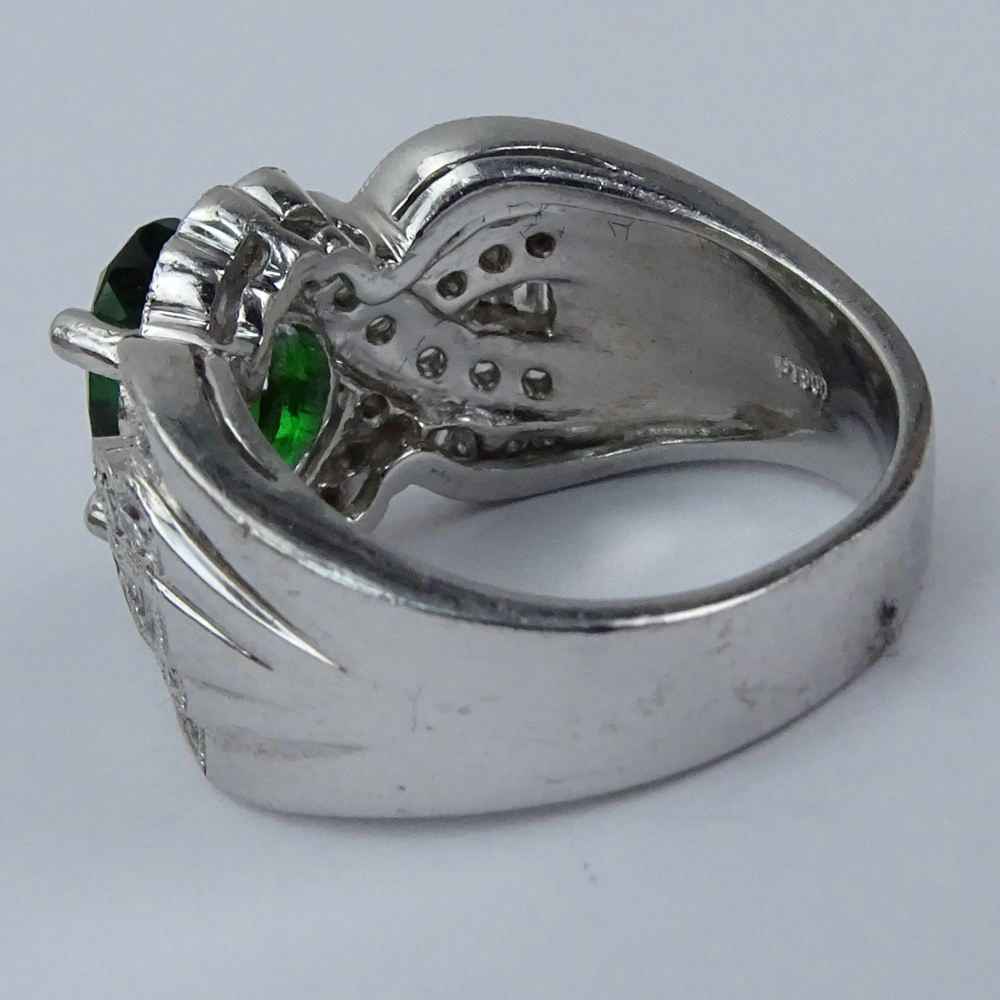 2.50 Carat Oval Cut Tsavorite Garnet, .84 carat Diamond and Platinum Ring.