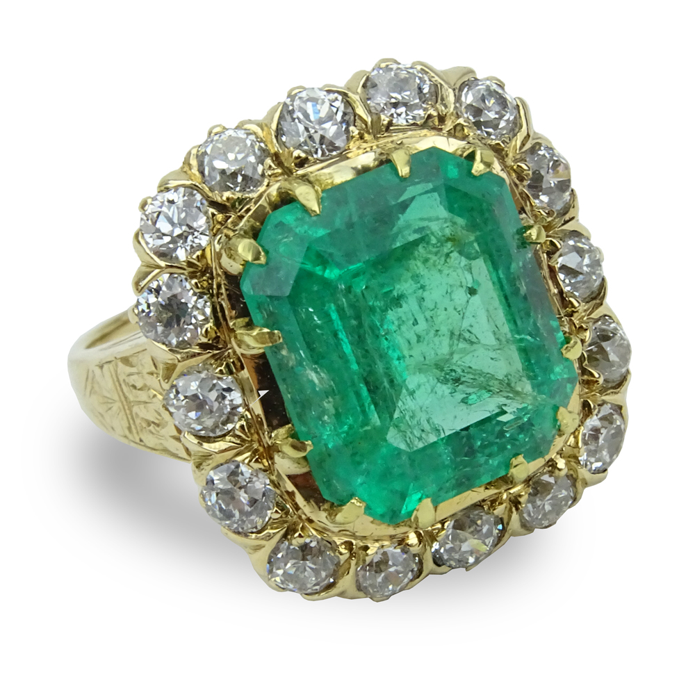  8.0 Carat Colombian Emerald, 2.0 Carat Round Brilliant Cut Diamond and 14 Karat yellow Gold Ring.