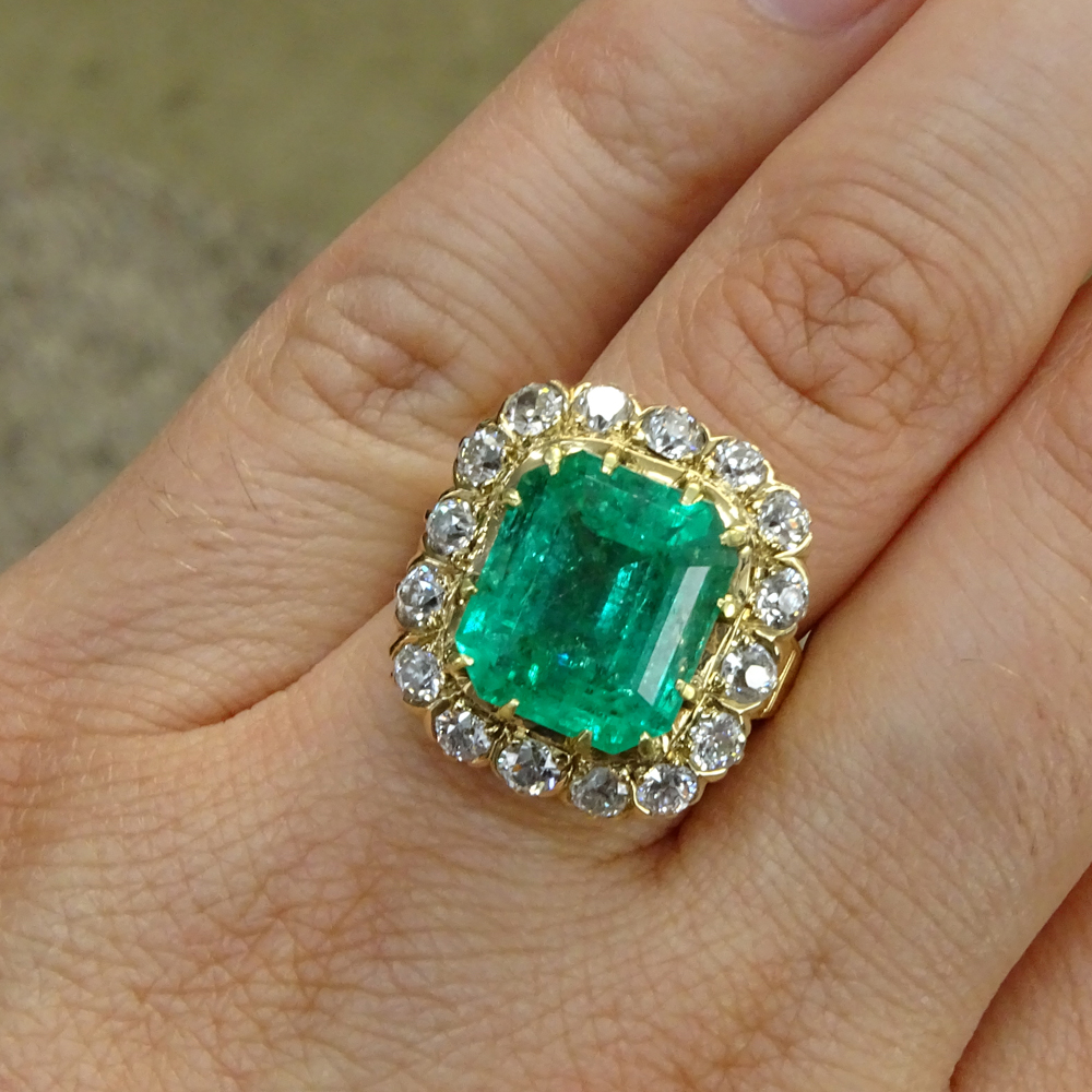  8.0 Carat Colombian Emerald, 2.0 Carat Round Brilliant Cut Diamond and 14 Karat yellow Gold Ring.