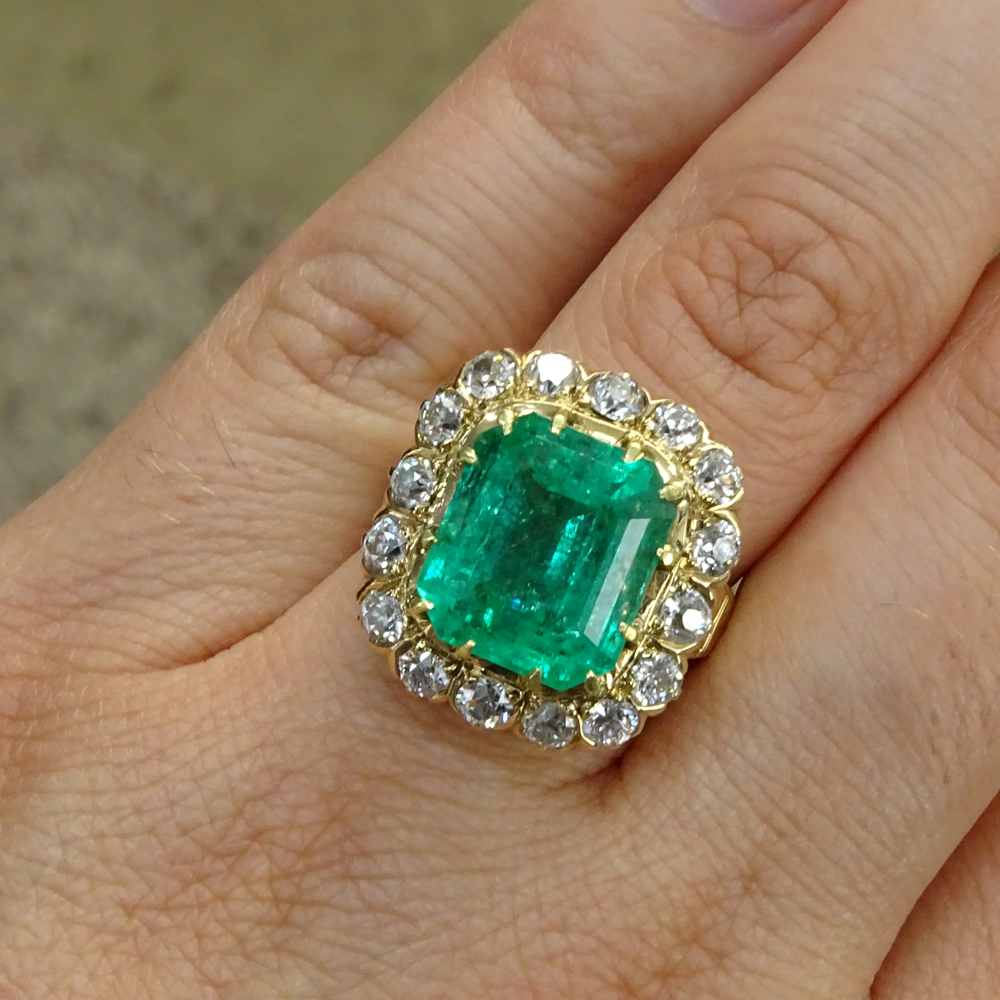  8.0 Carat Colombian Emerald, 2.0 Carat Round Brilliant Cut Diamond and 14 Karat yellow Gold Ring.