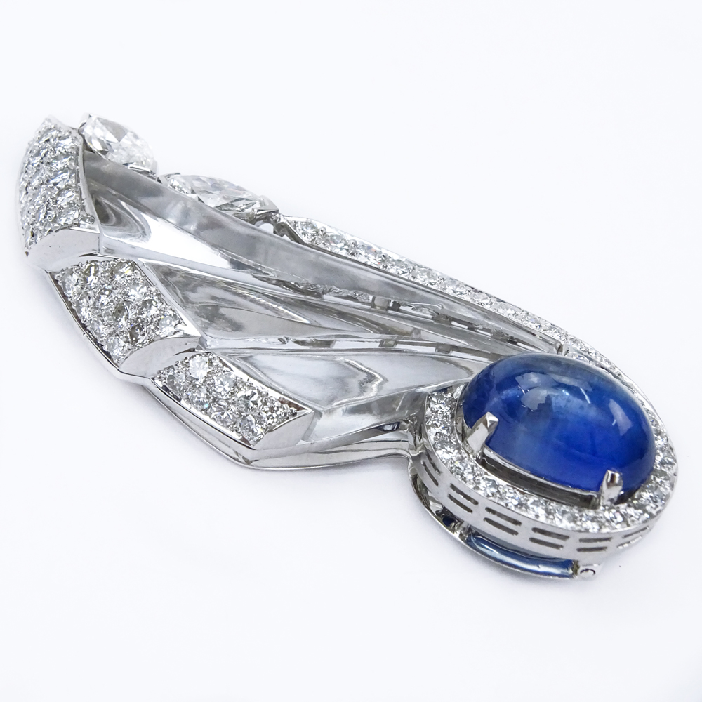  10.03 Carat Oval Cabochon No Heat Burma Sapphire, Diamond, 18 Karat White Gold and Carved Crystal Brooch.