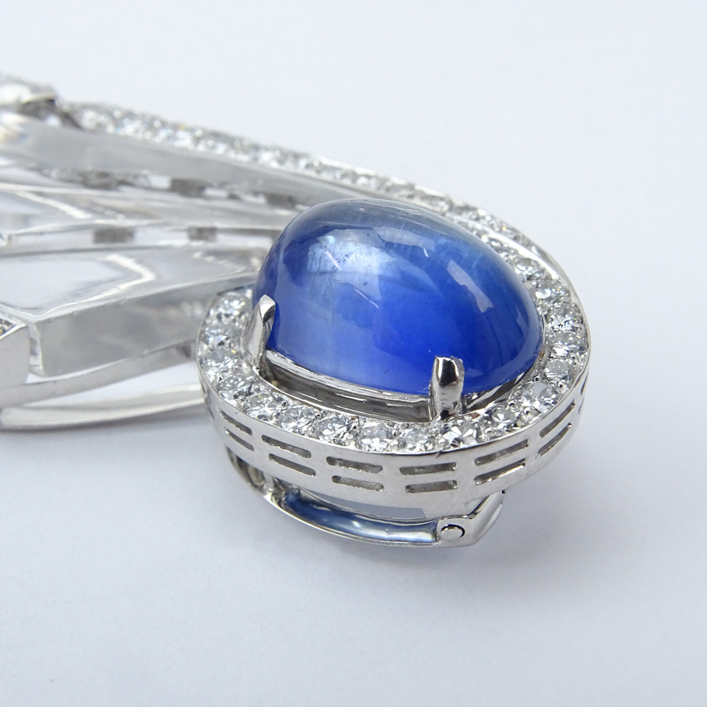  10.03 Carat Oval Cabochon No Heat Burma Sapphire, Diamond, 18 Karat White Gold and Carved Crystal Brooch.