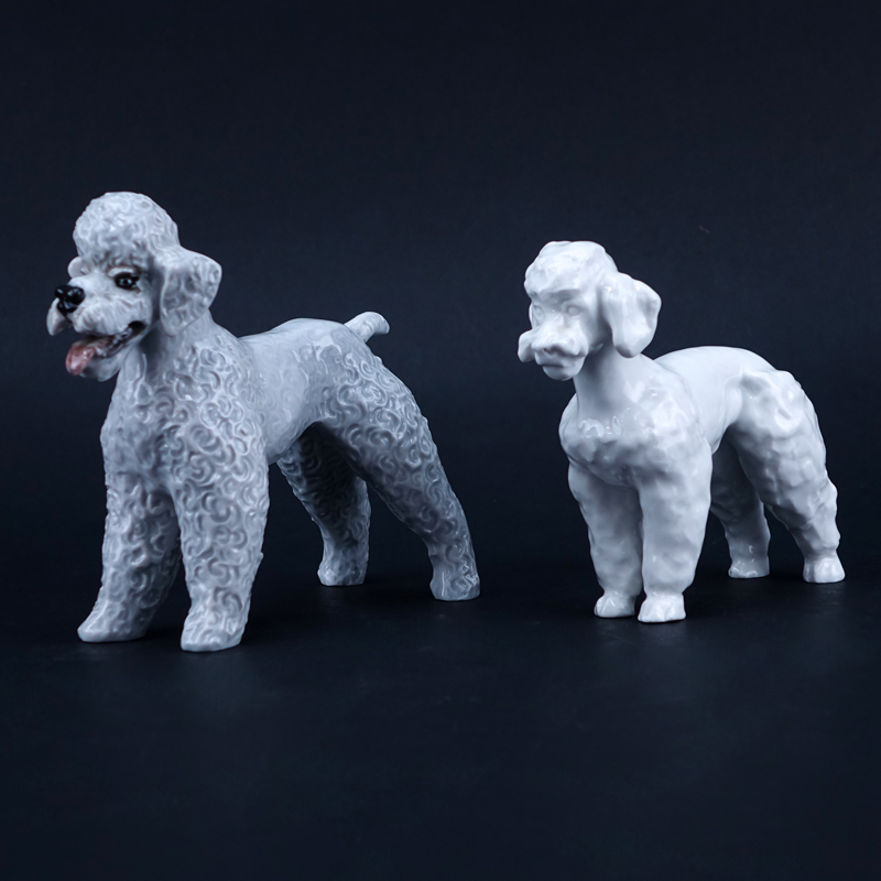 Two Porcelain Poodle Figurines