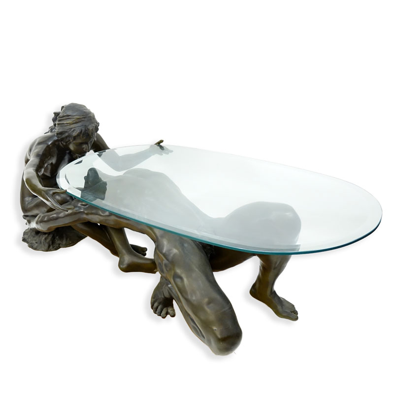 A Bronze Art Deco style Female and Male Nude Figural Glass Top Coffee Table