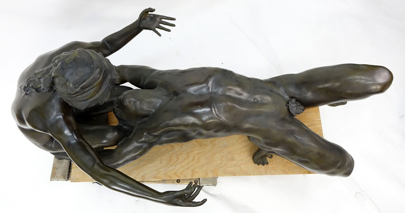 A Bronze Art Deco style Female and Male Nude Figural Glass Top Coffee Table
