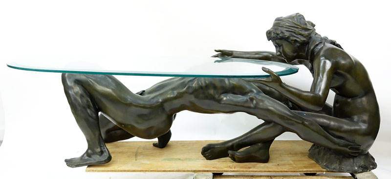 A Bronze Art Deco style Female and Male Nude Figural Glass Top Coffee Table