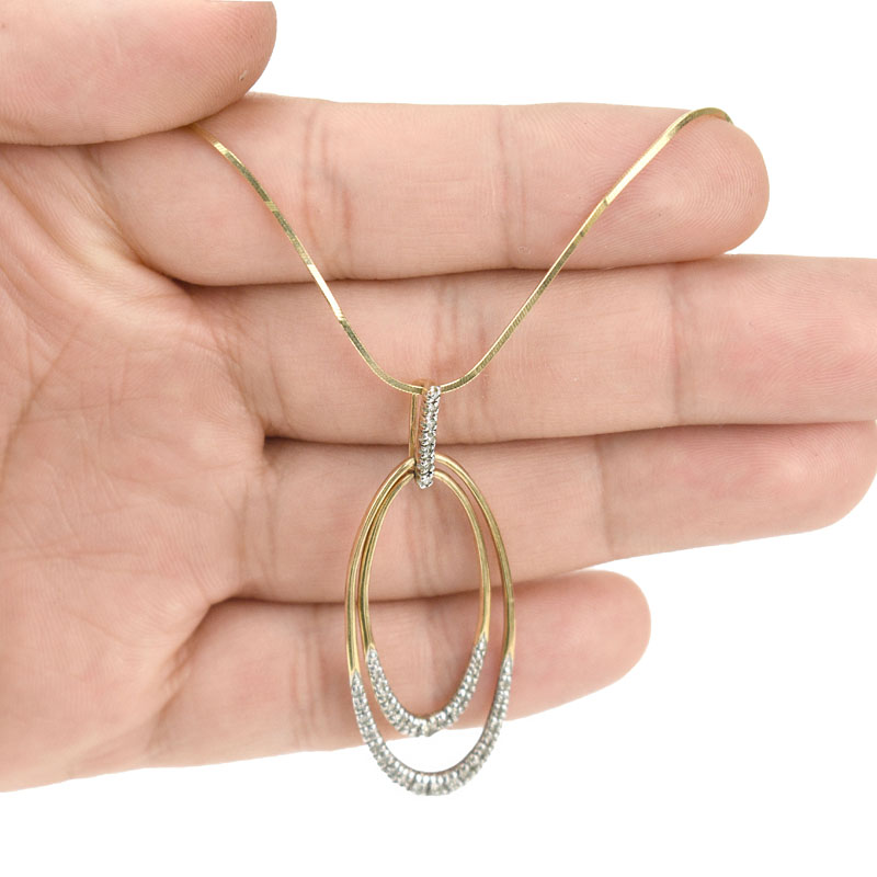 10 Karat Yellow Gold And Diamond Pendant Necklace