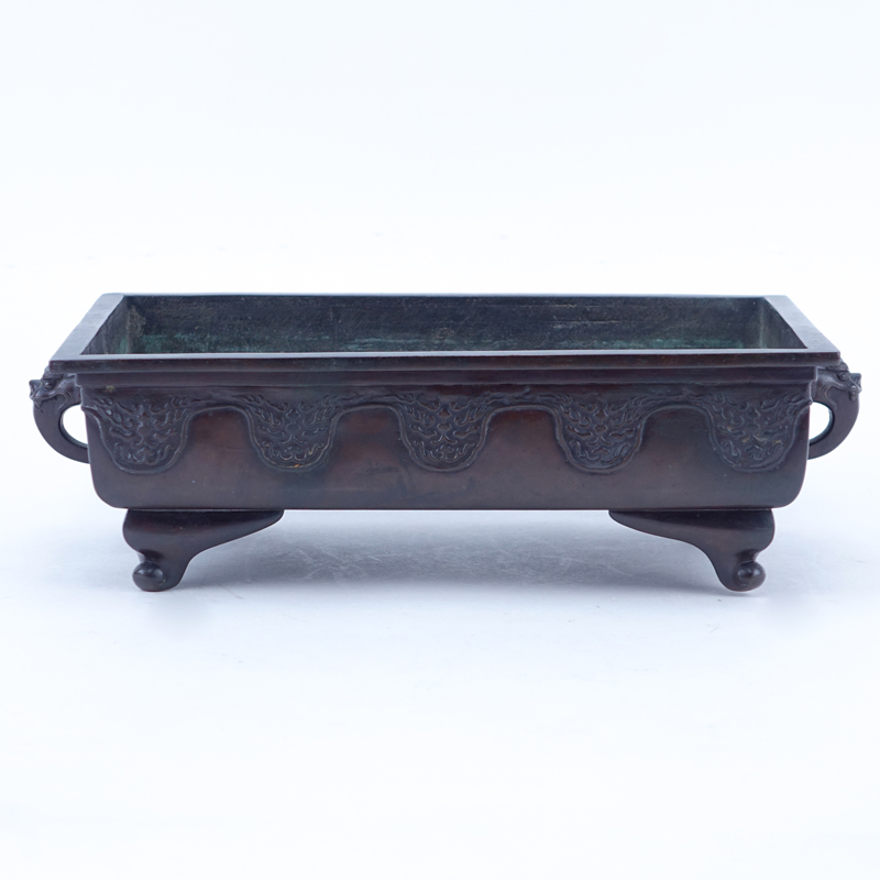 Chinese Bronze Footed Planter With Figural Handles