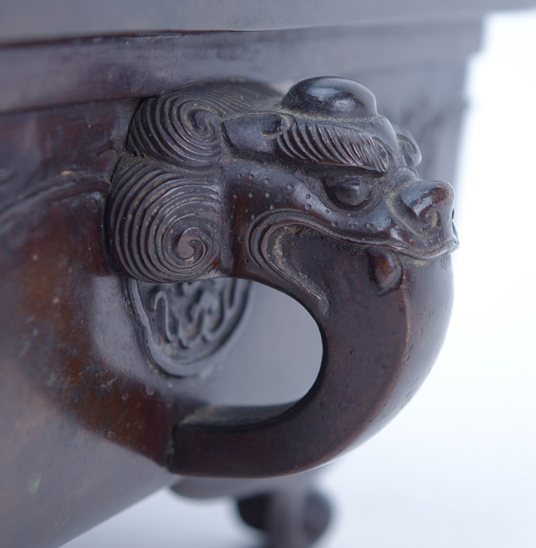 Chinese Bronze Footed Planter With Figural Handles