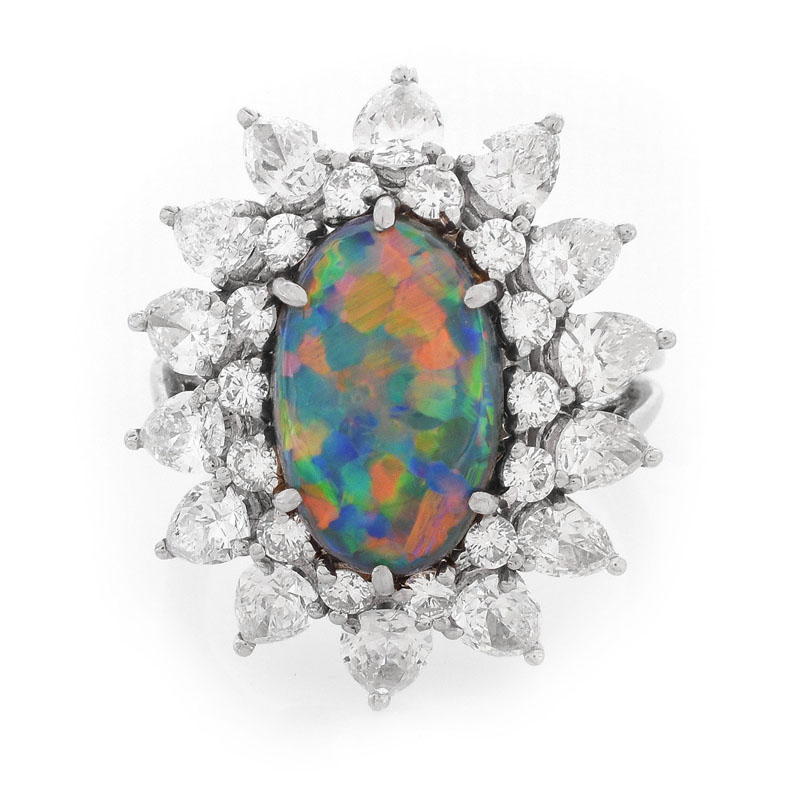 Vintage Tiffany & Co Oval Cabochon Black Opal, Pear Shape and Round Brilliant Cut Diamond and Platinum Ring