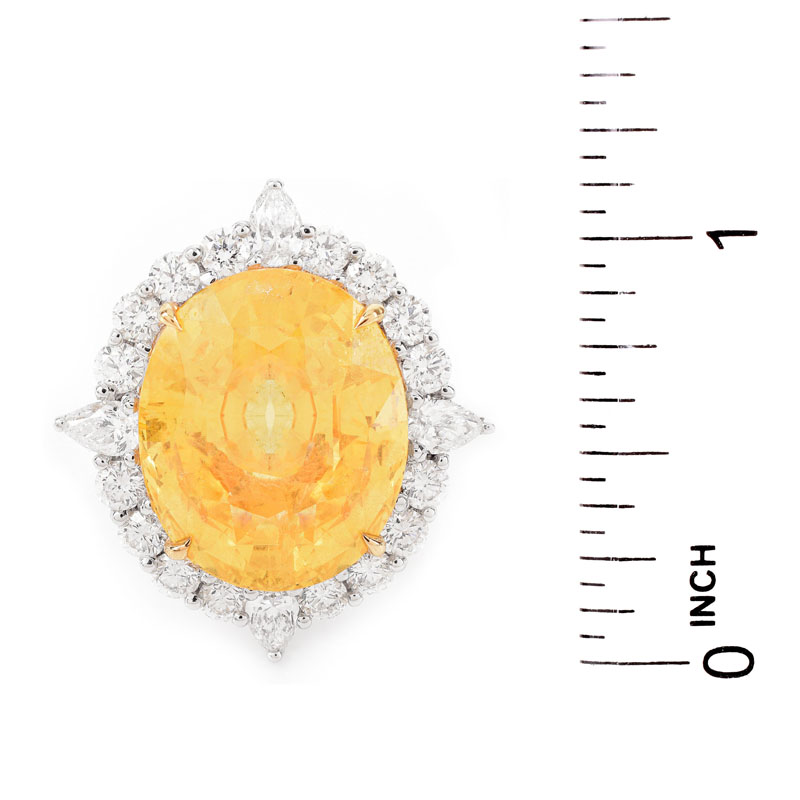 C. Dunaigre Switzerland Certified 22.60 Carat Oval Cut No Heat Ceylon Yellow Sapphire