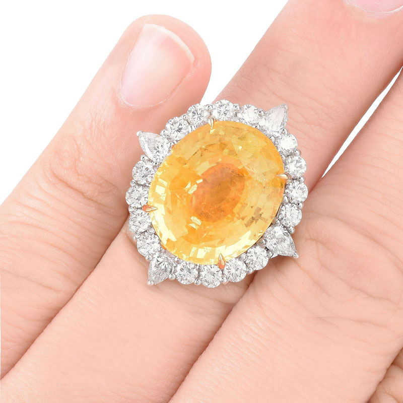 C. Dunaigre Switzerland Certified 22.60 Carat Oval Cut No Heat Ceylon Yellow Sapphire