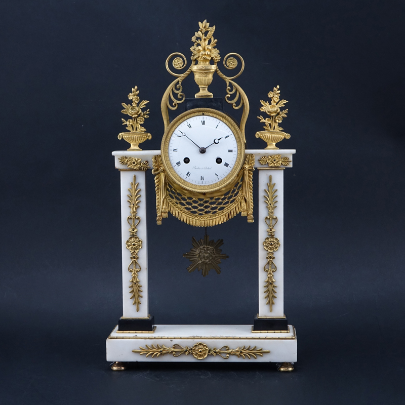 Antique French Marble And Gilt Bronze Clock.