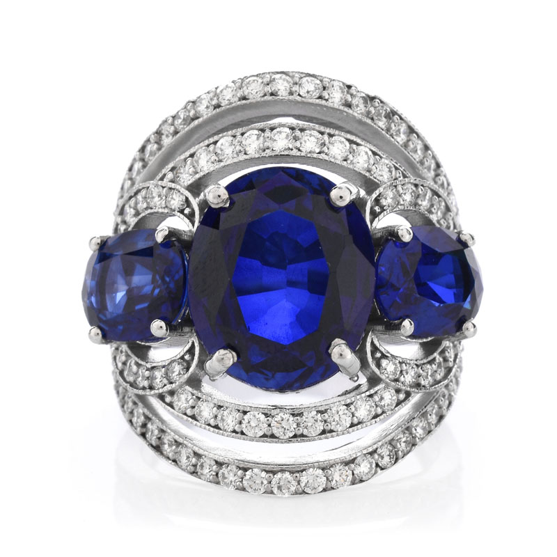 Approx. 10.30 Carat Oval Cut Synthetic Sapphire, 1.20 Carat Round Brilliant Cut Diamond and 18 Karat White Gold Ring