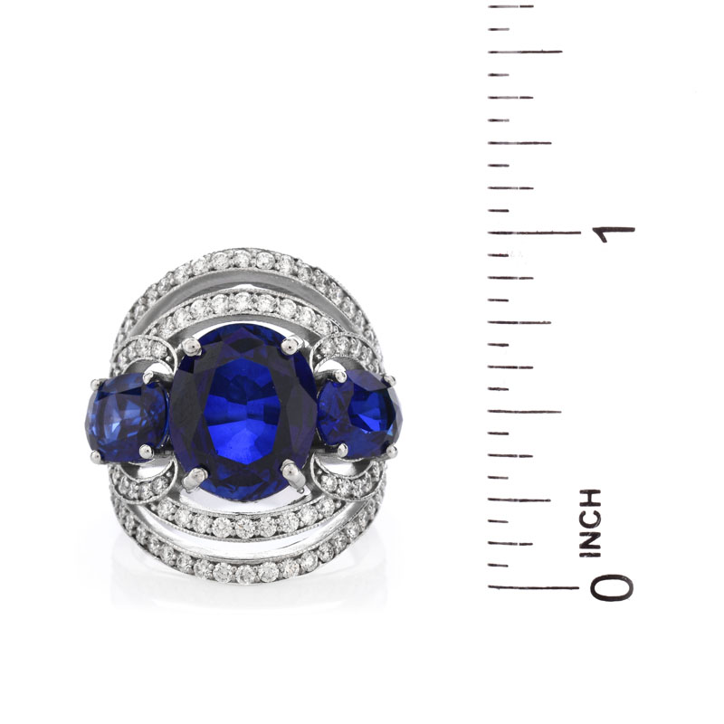 Approx. 10.30 Carat Oval Cut Synthetic Sapphire, 1.20 Carat Round Brilliant Cut Diamond and 18 Karat White Gold Ring