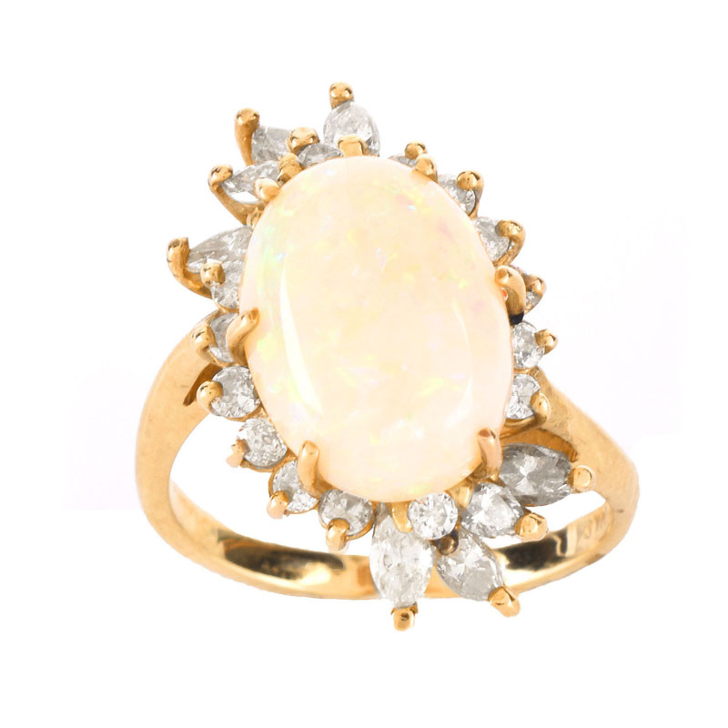 Vintage Approx. 5.0 Carat Oval Cabochon Opal, 1.25 Carat Diamond and 14 Karat Yellow Gold Ring