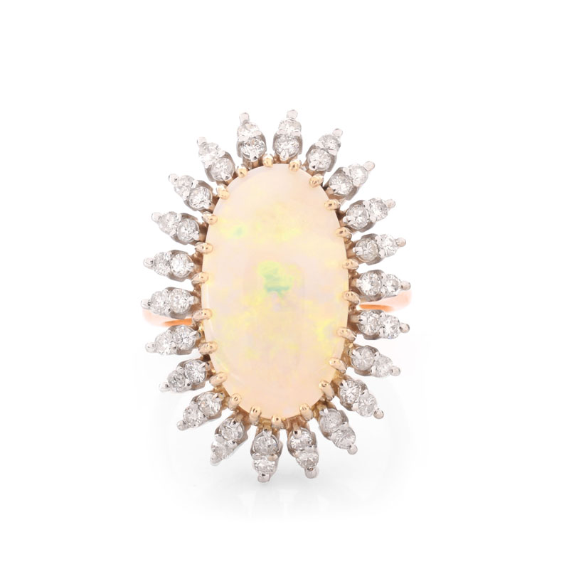 Vintage Approx. 4.60 Carat Oval Cabochon Opal, 1.0 Carat Round Brilliant Cut Diamond and 14 Karat Yellow Gold Ring