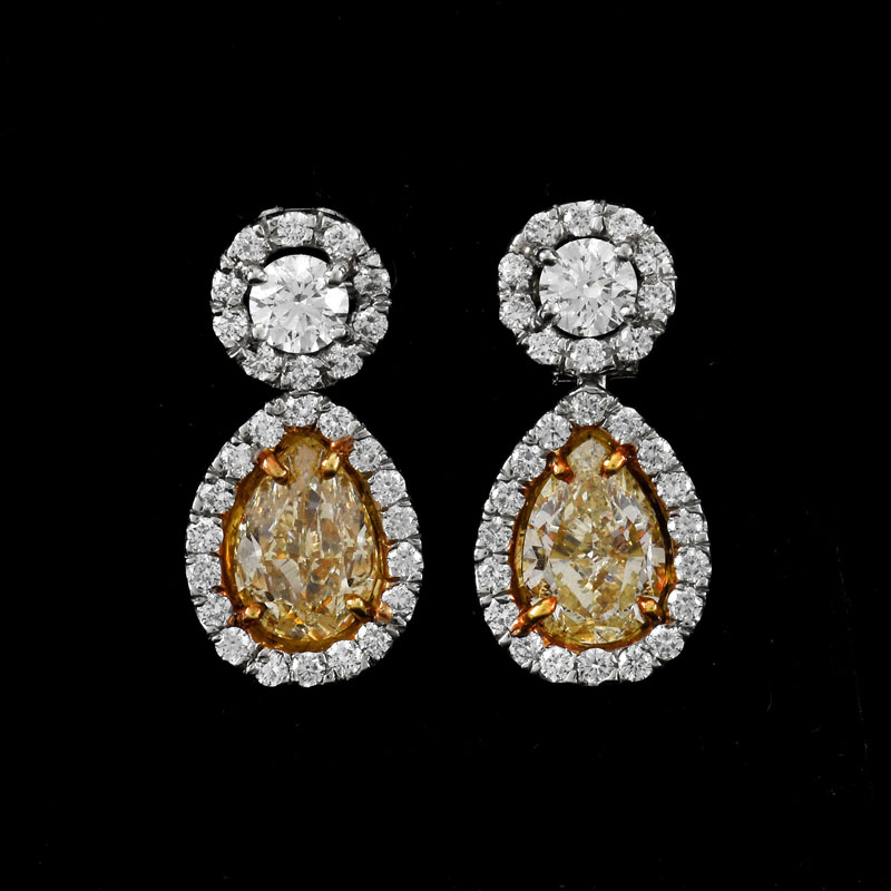 EGL Certified 2.04 Carat TW Fancy Light Yellow Diamond, .75 Carat Round Brilliant Cut Diamond and Platinum Earrings