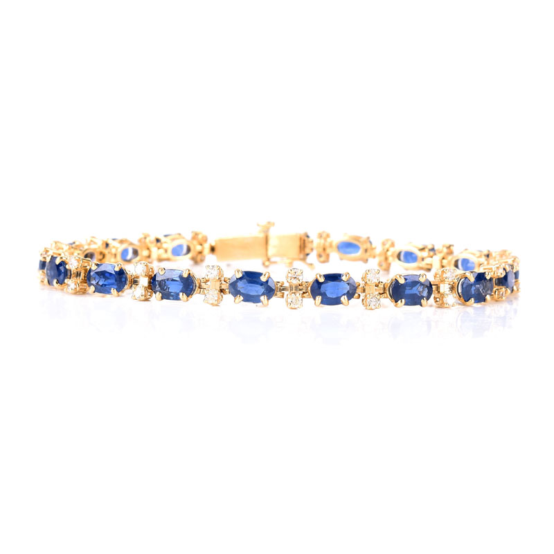 Vintage Oval Cut Synthetic Sapphire, Round Brilliant Cut Diamond and 14 Karat Yellow Gold Line Bracelet