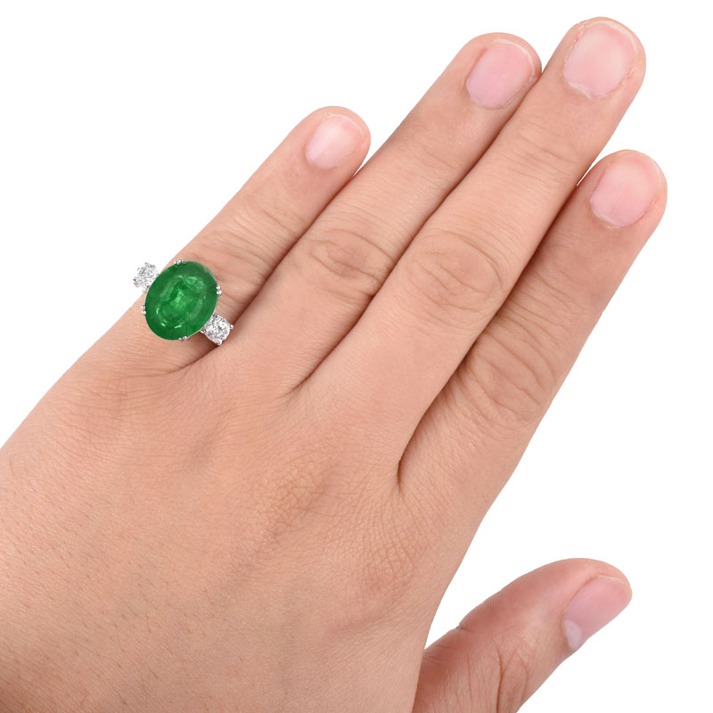 AGL Certified 7.34 Carat Oval Cut Brazilian Emerald, .80 Carat Diamond and 14 Karat White Gold Ring