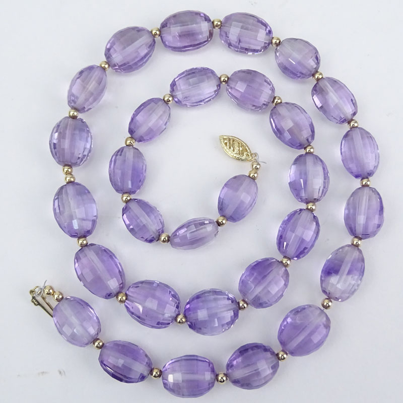 Approx. 162.0 Carat Oval Briolette Cut Graduated Amethyst Bead and 14 Karat Yellow Gold Necklace