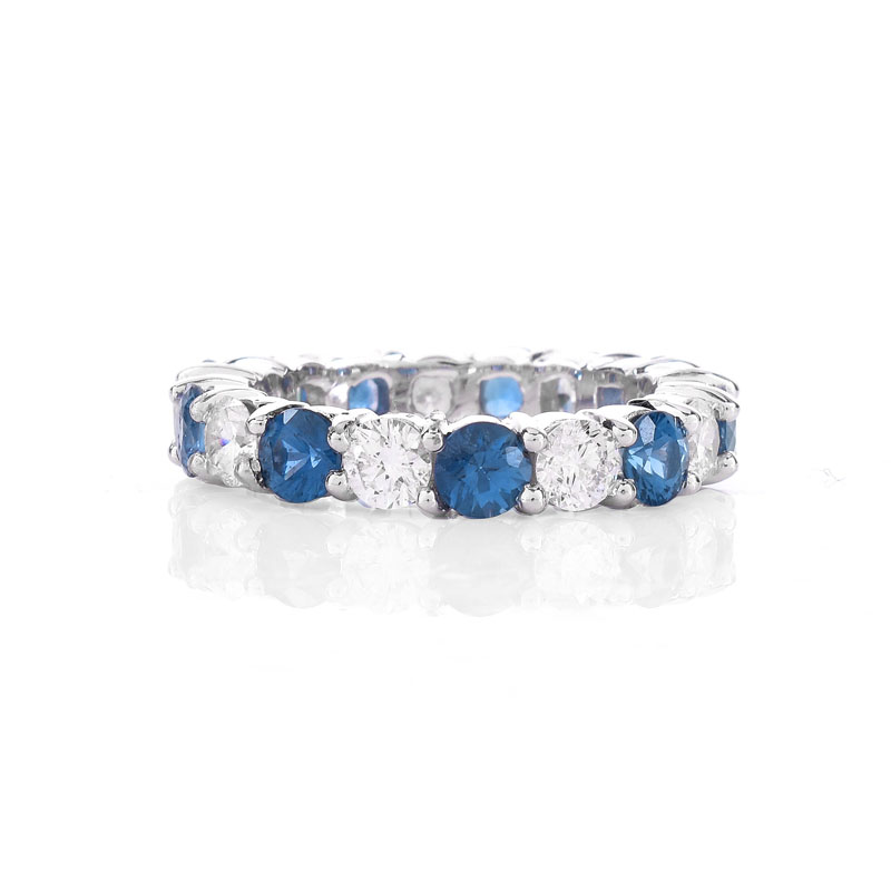 Approx. 2.62 Carat Round Brilliant Cut Sapphire, 1.85 Carat Round Brilliant Cut Diamond and 18 Karat White Gold Eternity Band