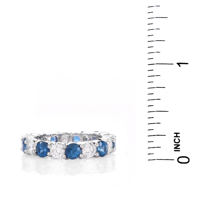 Approx. 2.62 Carat Round Brilliant Cut Sapphire, 1.85 Carat Round Brilliant Cut Diamond and 18 Karat White Gold Eternity Band