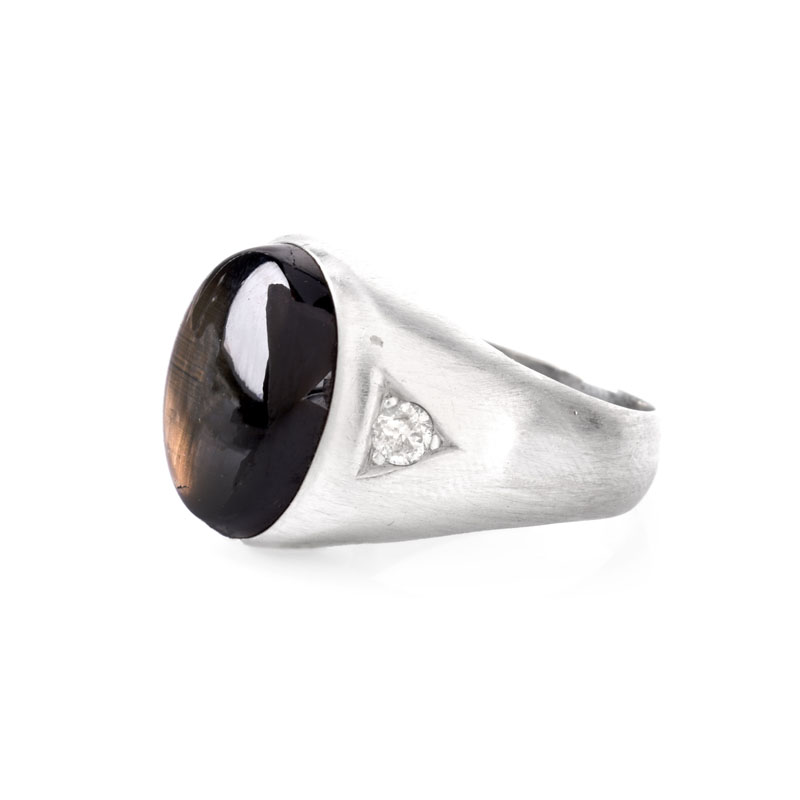 Man's Vintage Approx. 12.0 Carat Black Star Sapphire, .30 Carat Diamond and 14 Karat White Gold Ring