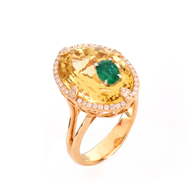 9.52 Carat Oval Cut Heliodor, .44 Carat Oval Cut Emerald, .23 Carat Diamond and 18 Karat Yellow Gold Ring