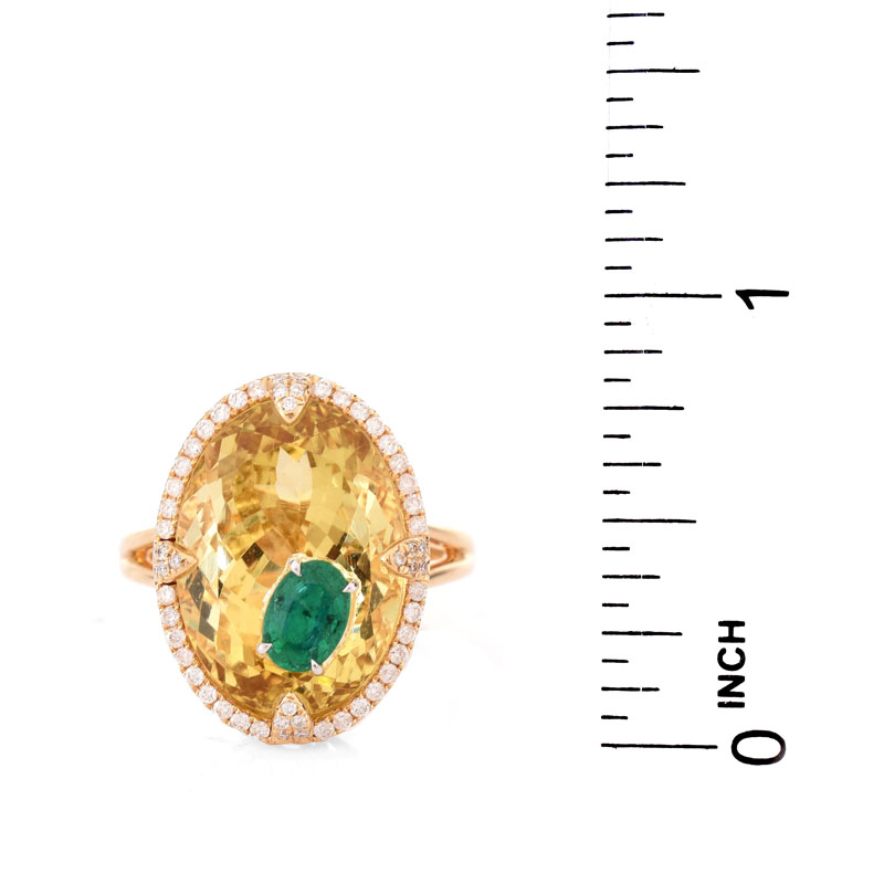 9.52 Carat Oval Cut Heliodor, .44 Carat Oval Cut Emerald, .23 Carat Diamond and 18 Karat Yellow Gold Ring