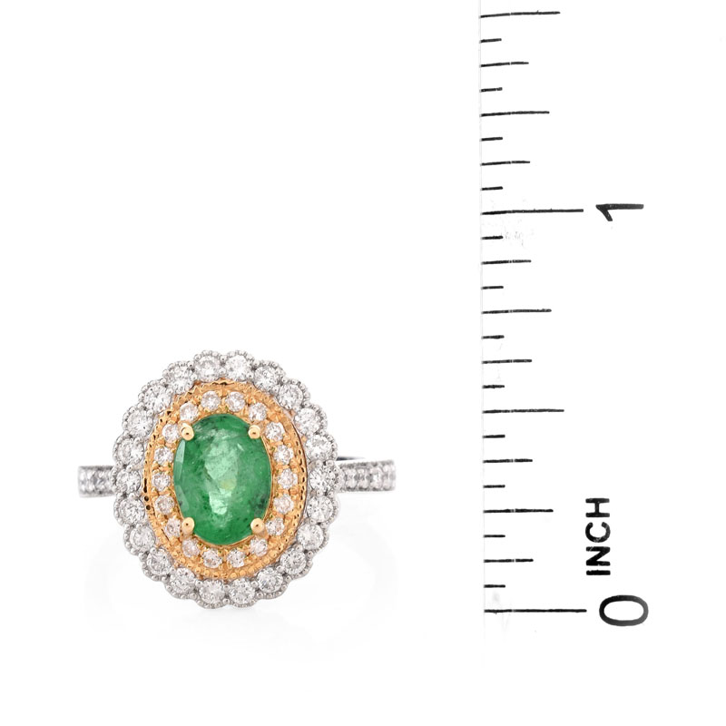 Oval Cut Emerald, Round Brilliant Cut Yellow and White Diamond and 14 Karat White Gold Ring