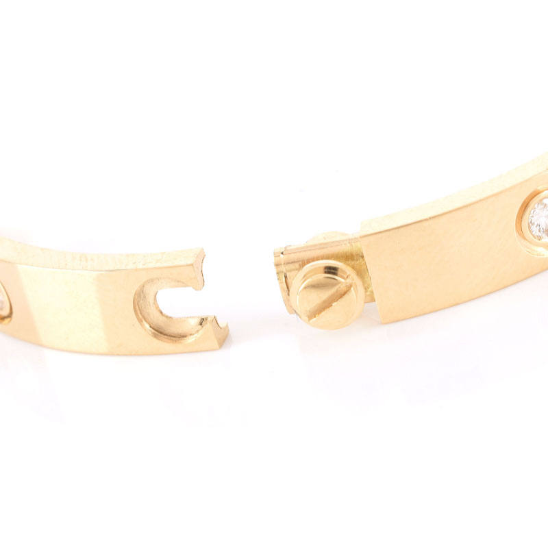 Cartier 18 Karat Yellow Gold and Ten (1) Round Brilliant Cut Diamond Love Bracelet