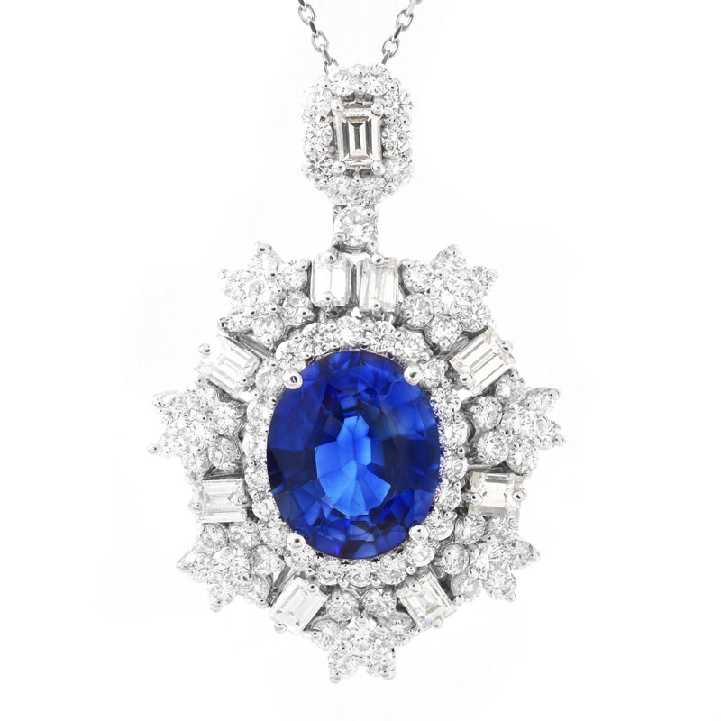 Approx. 5.56 Carat Oval Cut Sapphire, 2.28 Carat Baguette and Round Brilliant Cut Diamond and 18 Karat White Gold Pendant Necklace