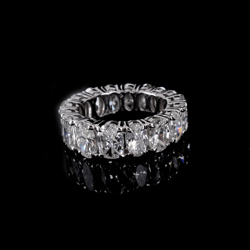 Approx. 8.0 Carat Oval Cut Diamond and 18 Karat White Eternity Band