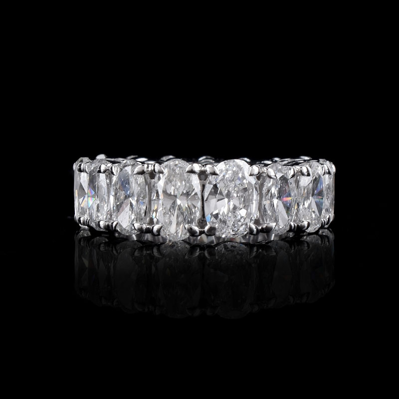 Approx. 8.0 Carat Oval Cut Diamond and 18 Karat White Eternity Band