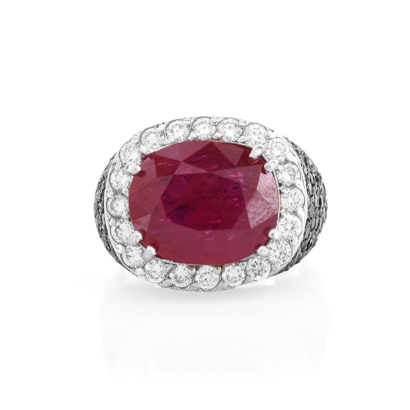 Approx. 5.11 Carat Oval Cut Ruby, 3.50 Carat Micro Pave Set Black Diamond, .61 Carat Round Brilliant Cut Diamond and 18 Karat White Gold Ring